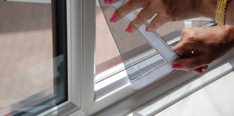 Fly screen fitted to an open window